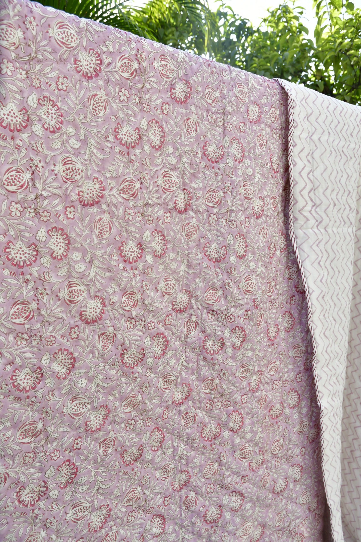 Pink and white quilt