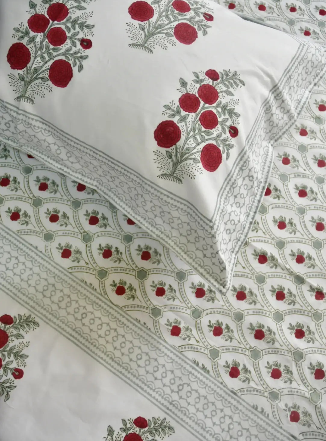White fabric with red floral pattern