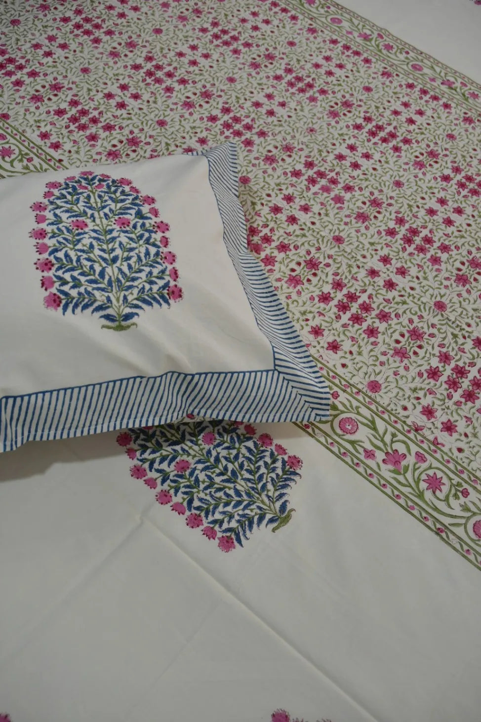 Floral patterned bedsheet with embroidered designs