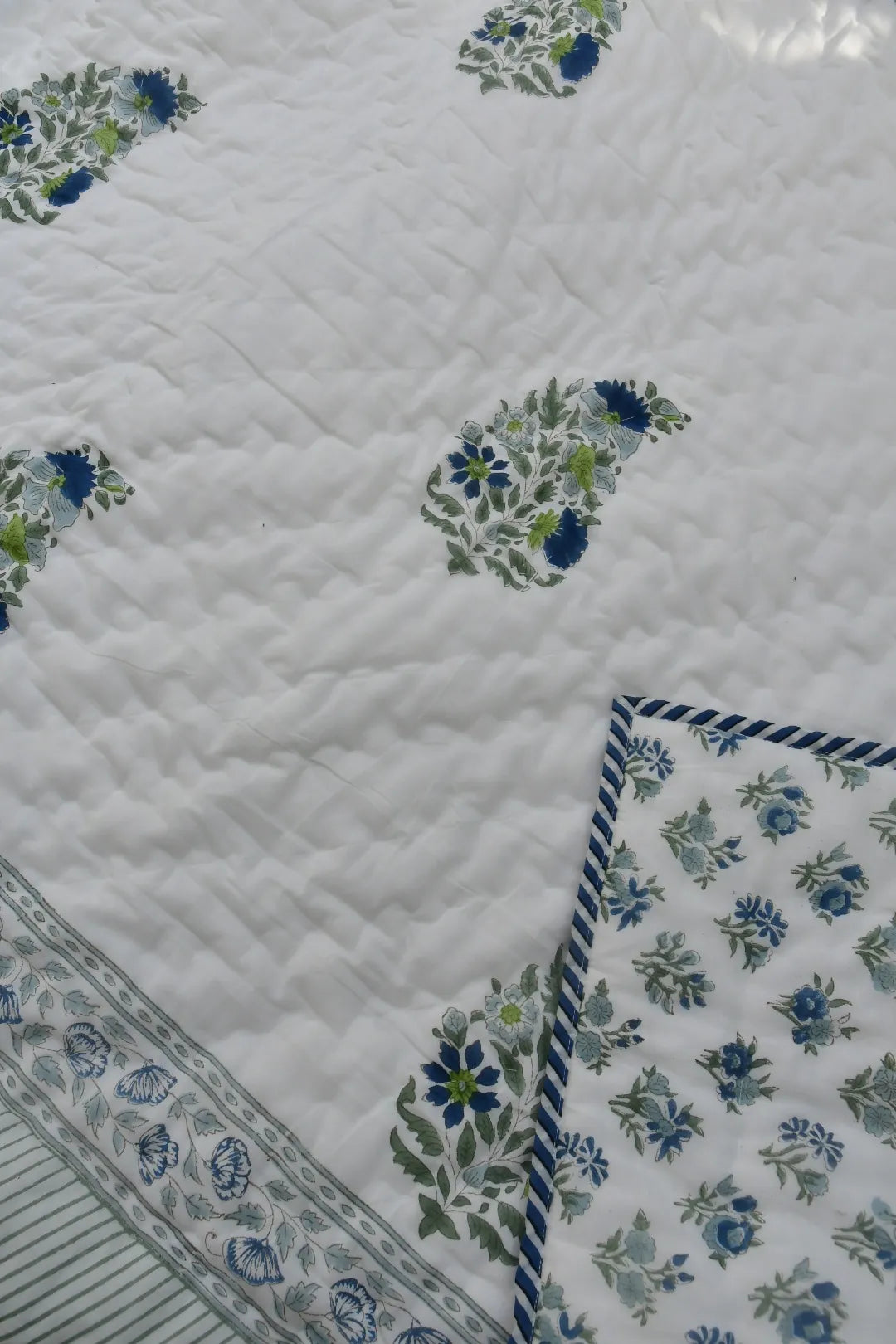 Floral patterned Rajai with a white background