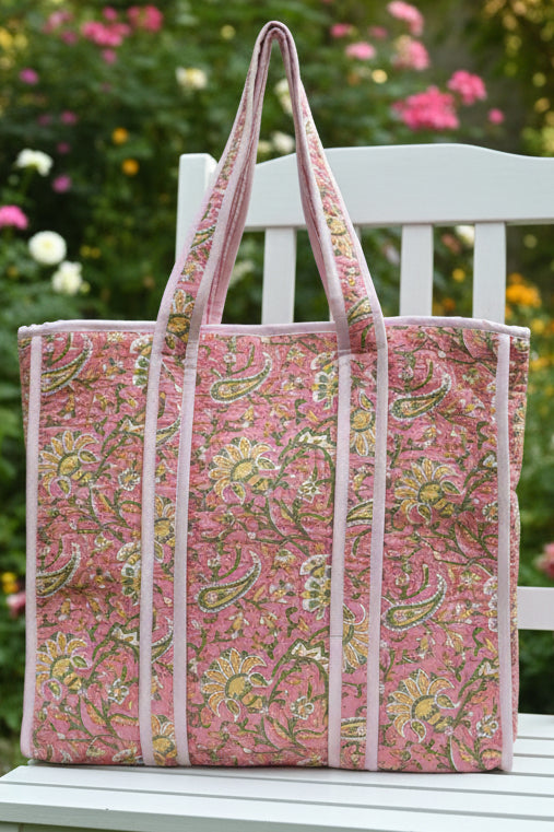 Floral-patterned tote bag on a plain background