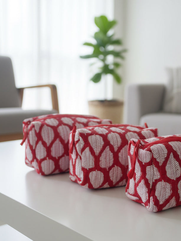 Red and white patterned fabric on a wooden surface