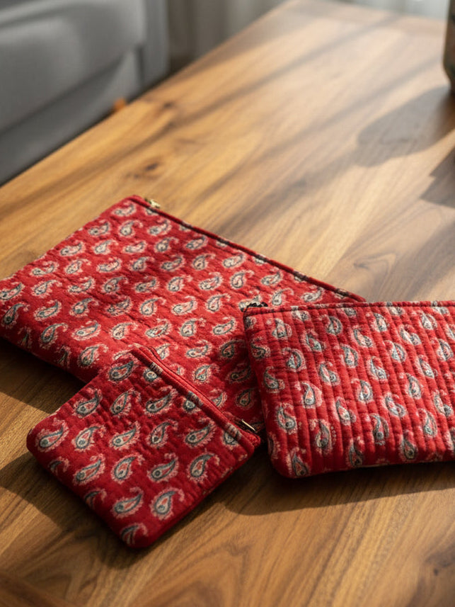 Red patterned fabric on a floral-patterned background
