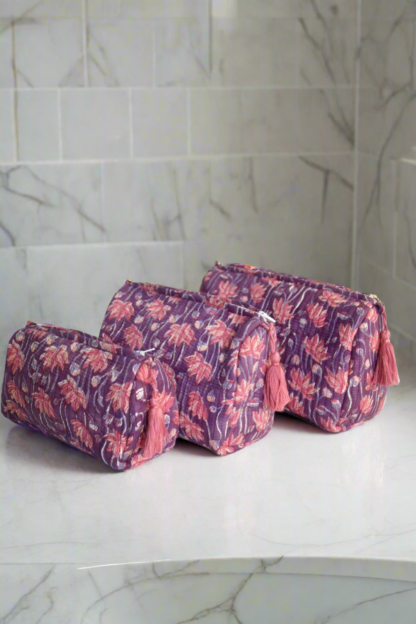 Pink and purple toiletry bags