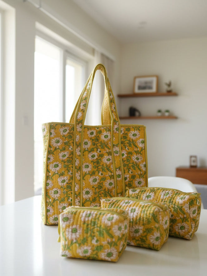 Yellow floral-patterned bags on a floral fabric background
