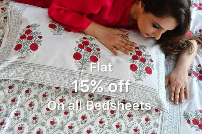 Woman lying on a floral bedspread with promotional text overlay
