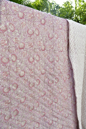 Pink and white quilt 