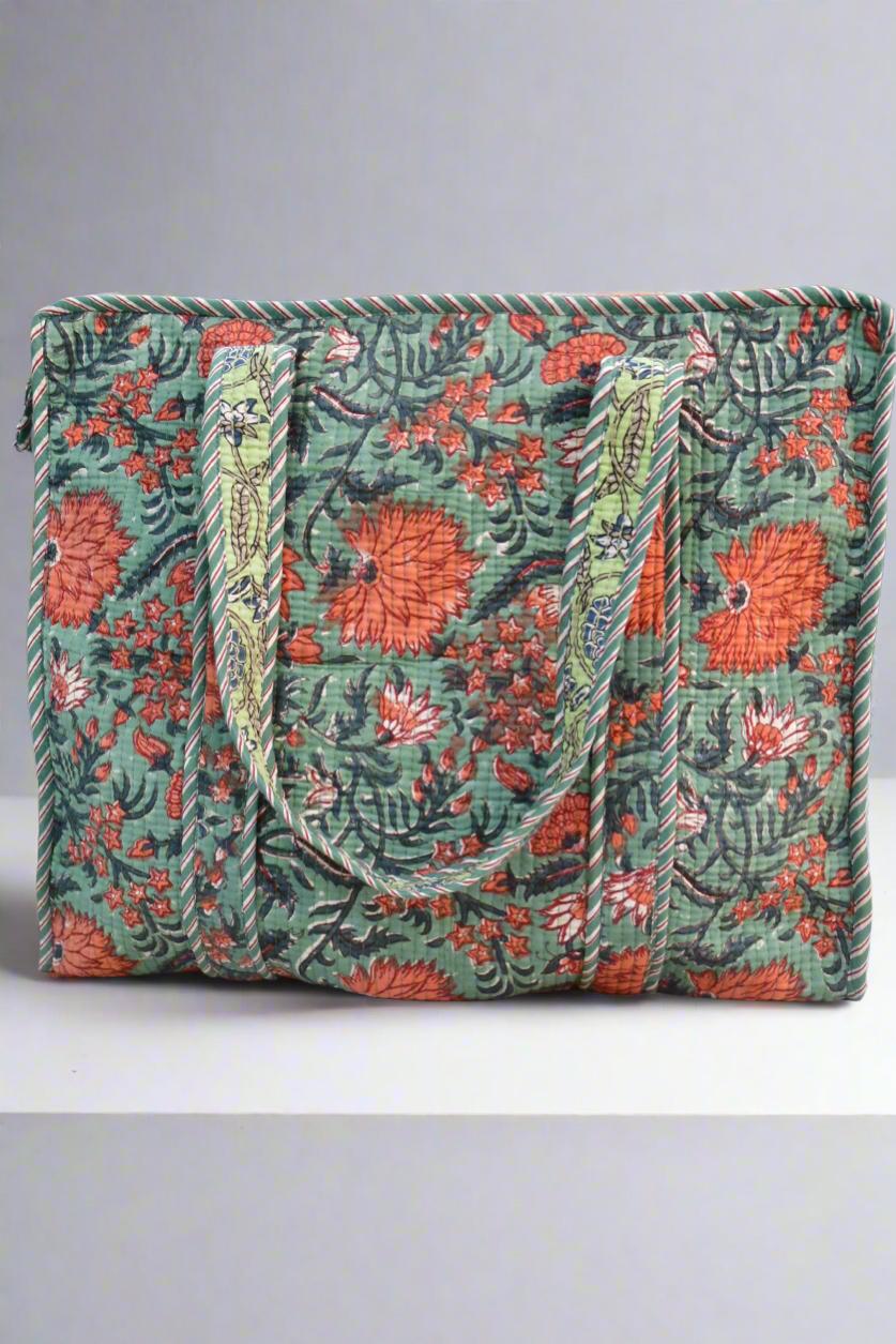 Floral patterned bag with green background