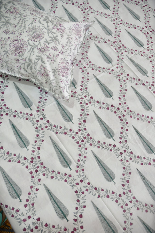 Floral patterned fabric with a pillow on a matching background