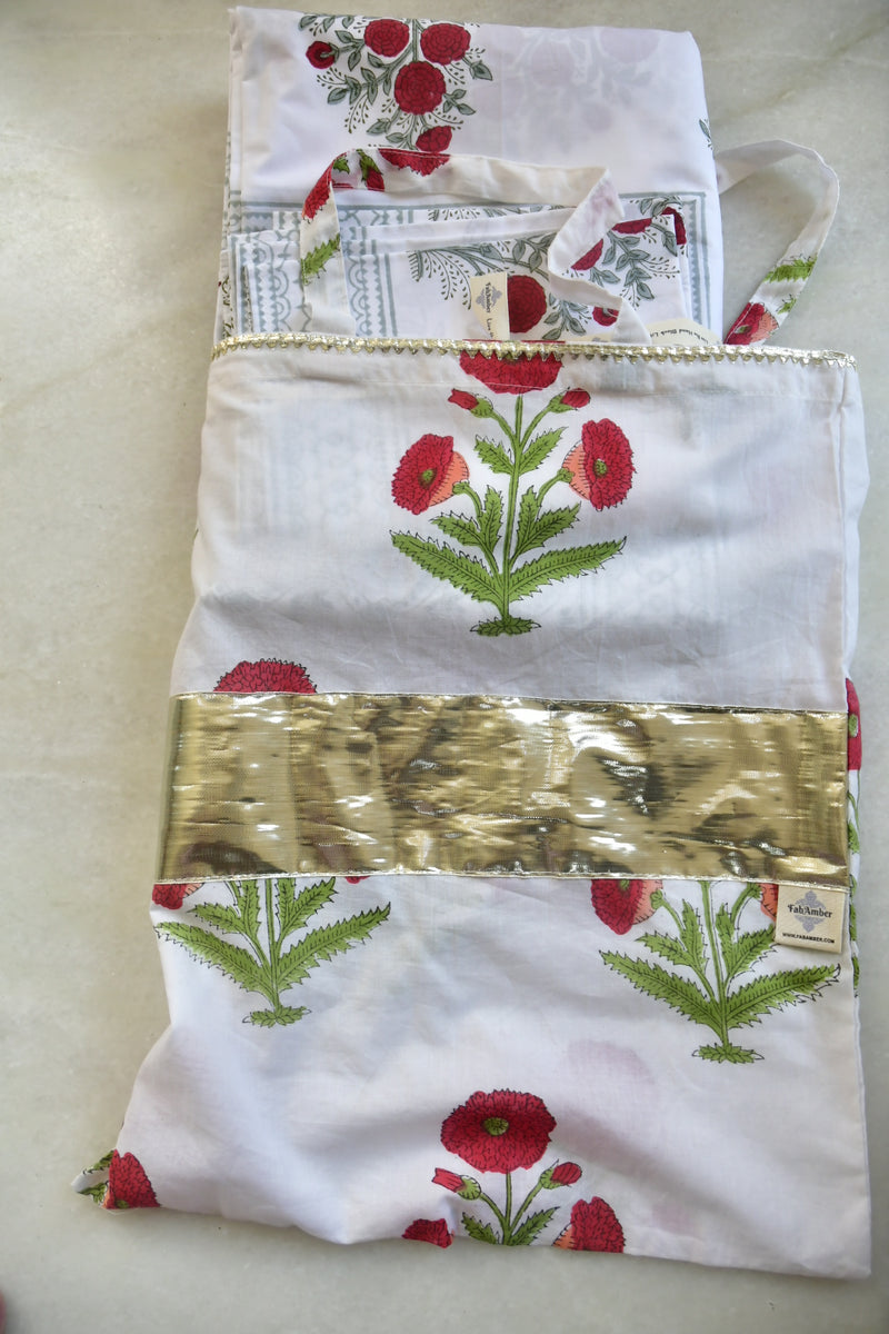 Fabric with floral pattern and text on a plain background