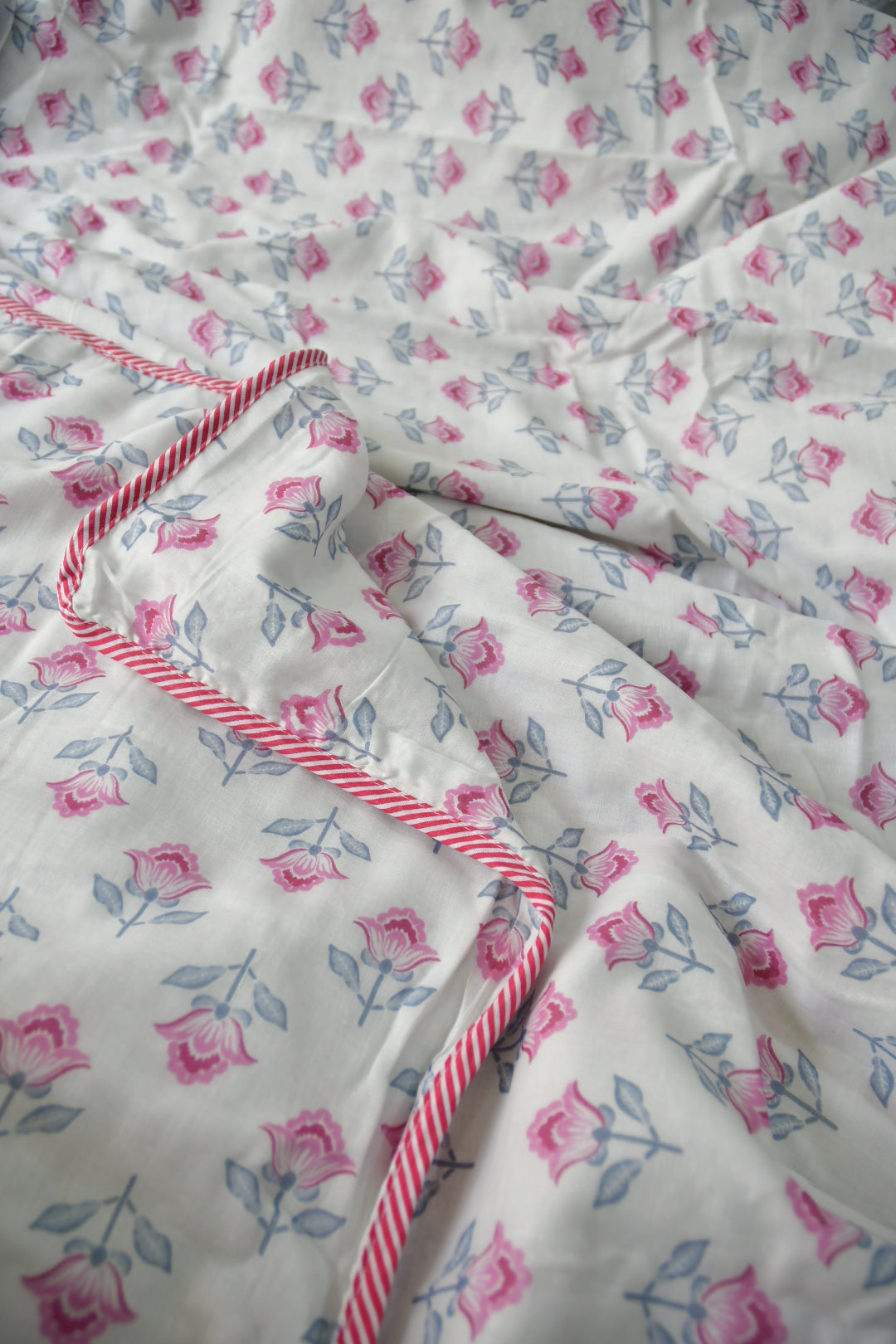 Pink buta on white dohar 