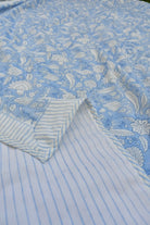 Close-up of blue floral and striped fabric