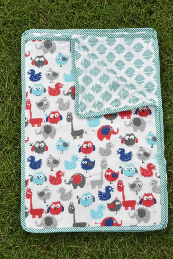 Children's Dohar with animal patterns on a grass background