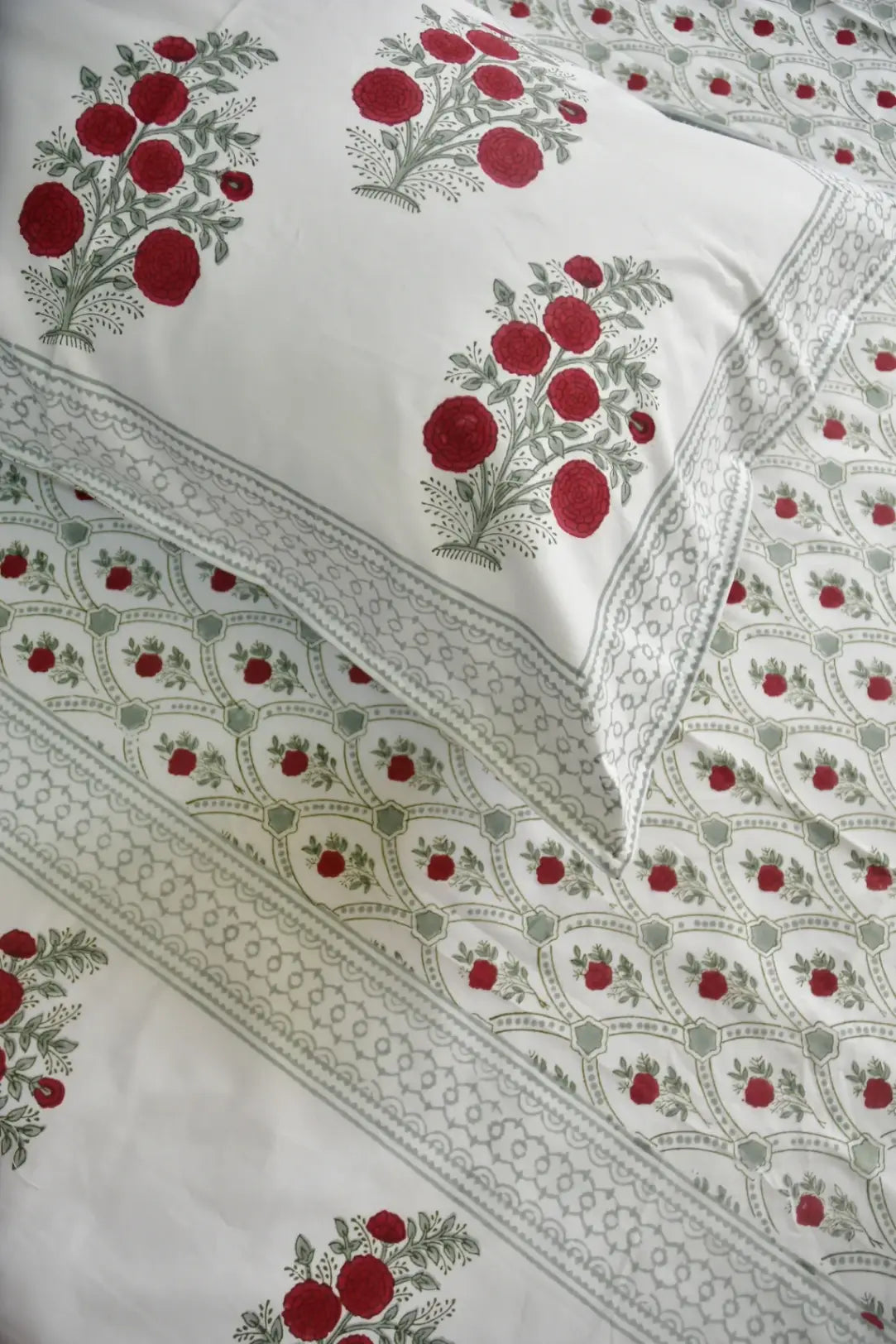 White fabric with red floral pattern