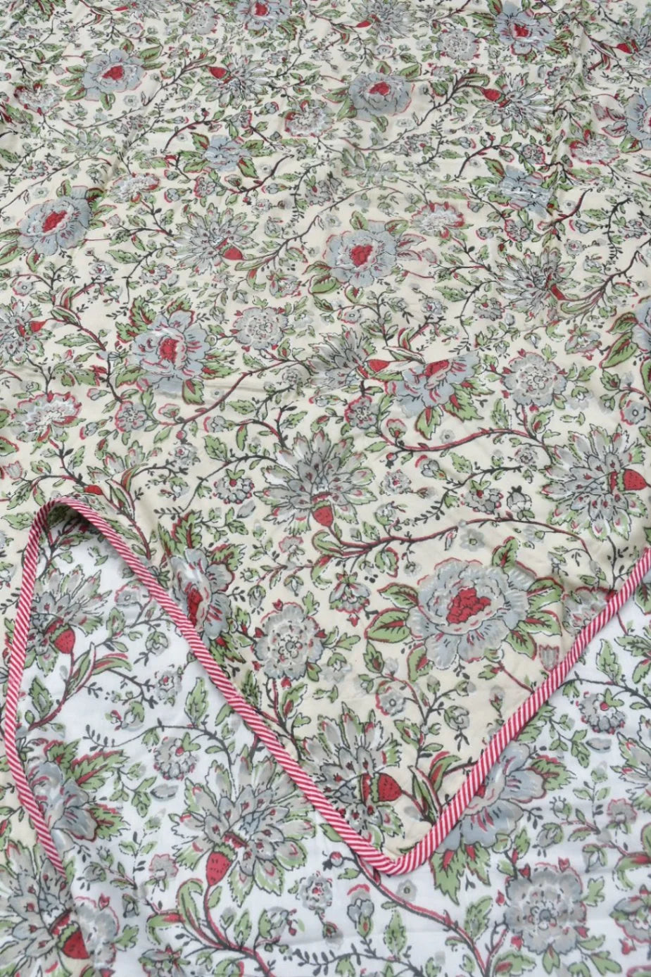Floral patterned fabric with a pink border