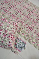 Jaipuri Bedsheet with pink flowers on a white background