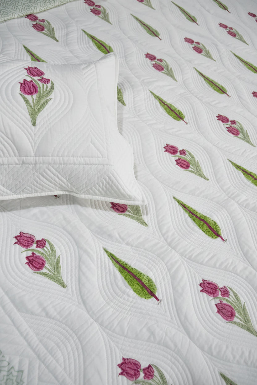 Floral Bedcover with pink tulips and green leaves on a white background