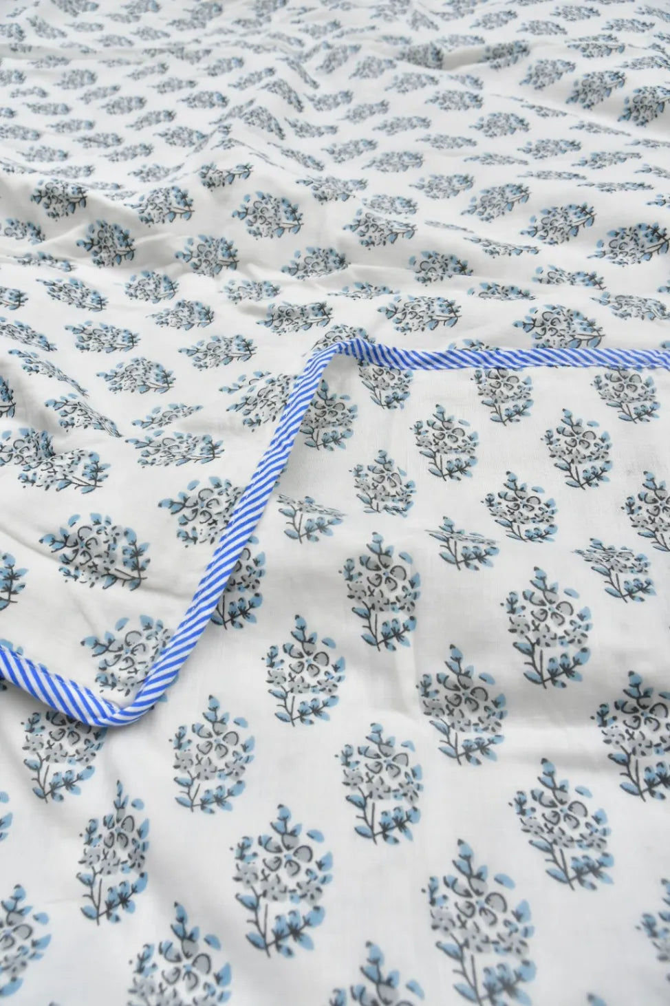 Floral patterned Dohar with blue and white trim