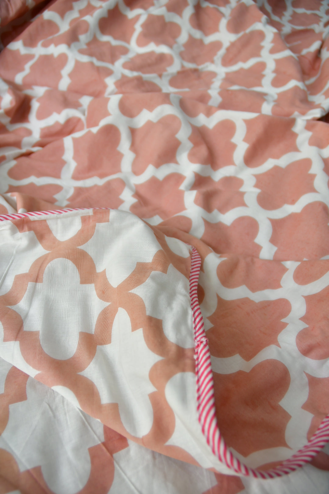 Peach and white dohar