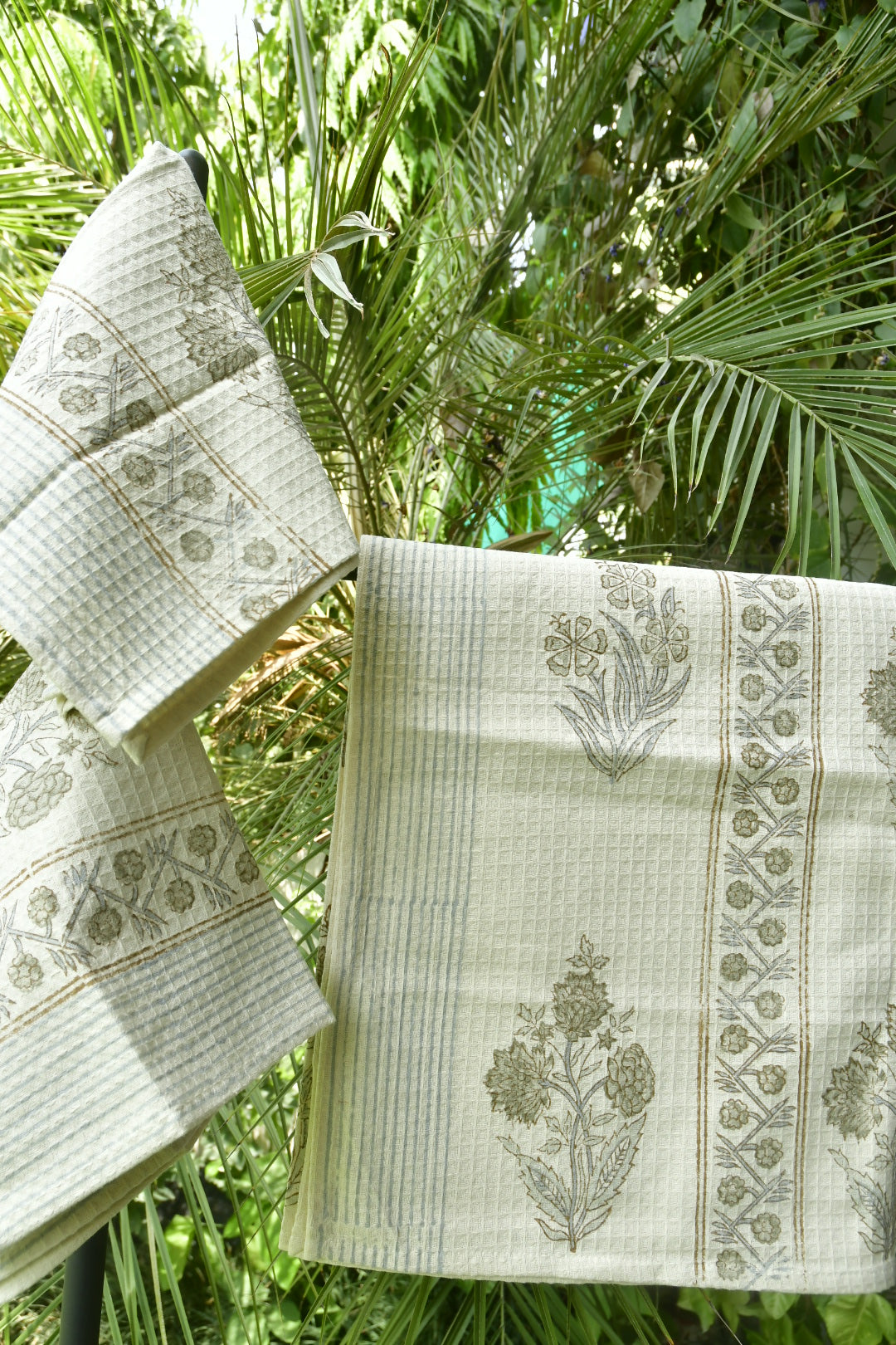 Beige bath towel with grey buta
