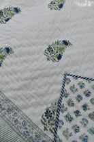 Floral patterned Rajai with a white background