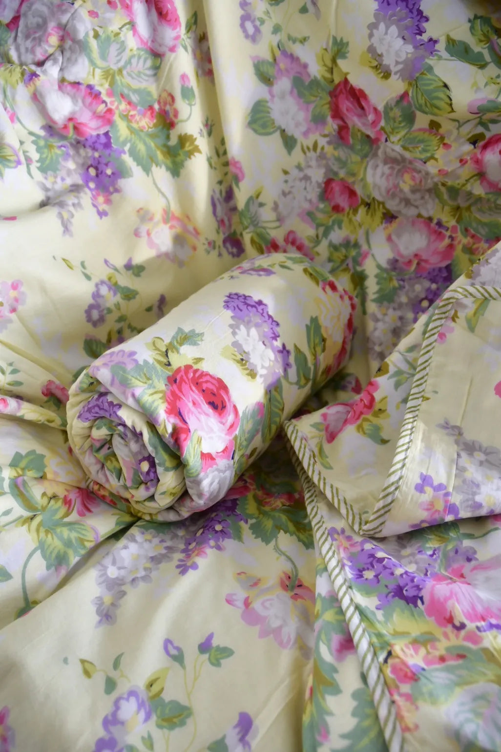 Floral patterned bedding & Dohar on a floral bedspread