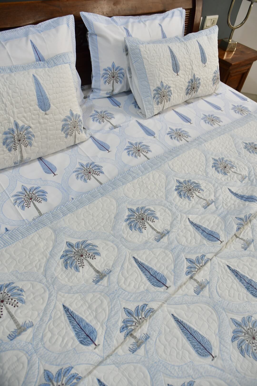 Blue Palm Jaal Buta hand block printed cotton bedding set with quilted bedcover and matching bedsheet