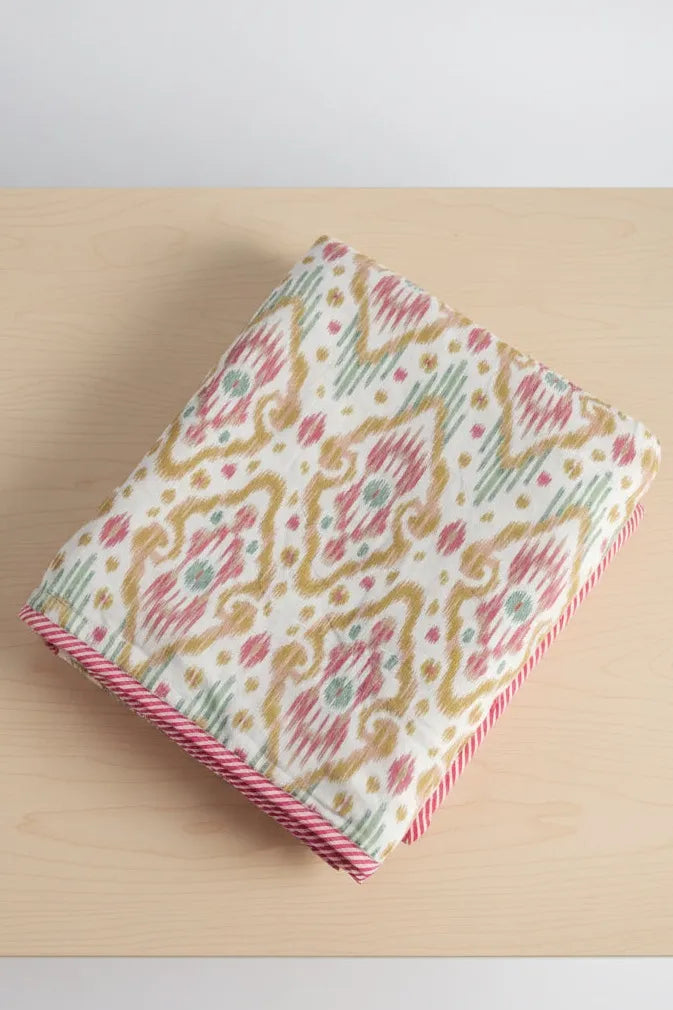 Fabric with a decorative pattern on a wooden surface