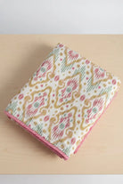 Fabric with a decorative pattern on a wooden surface