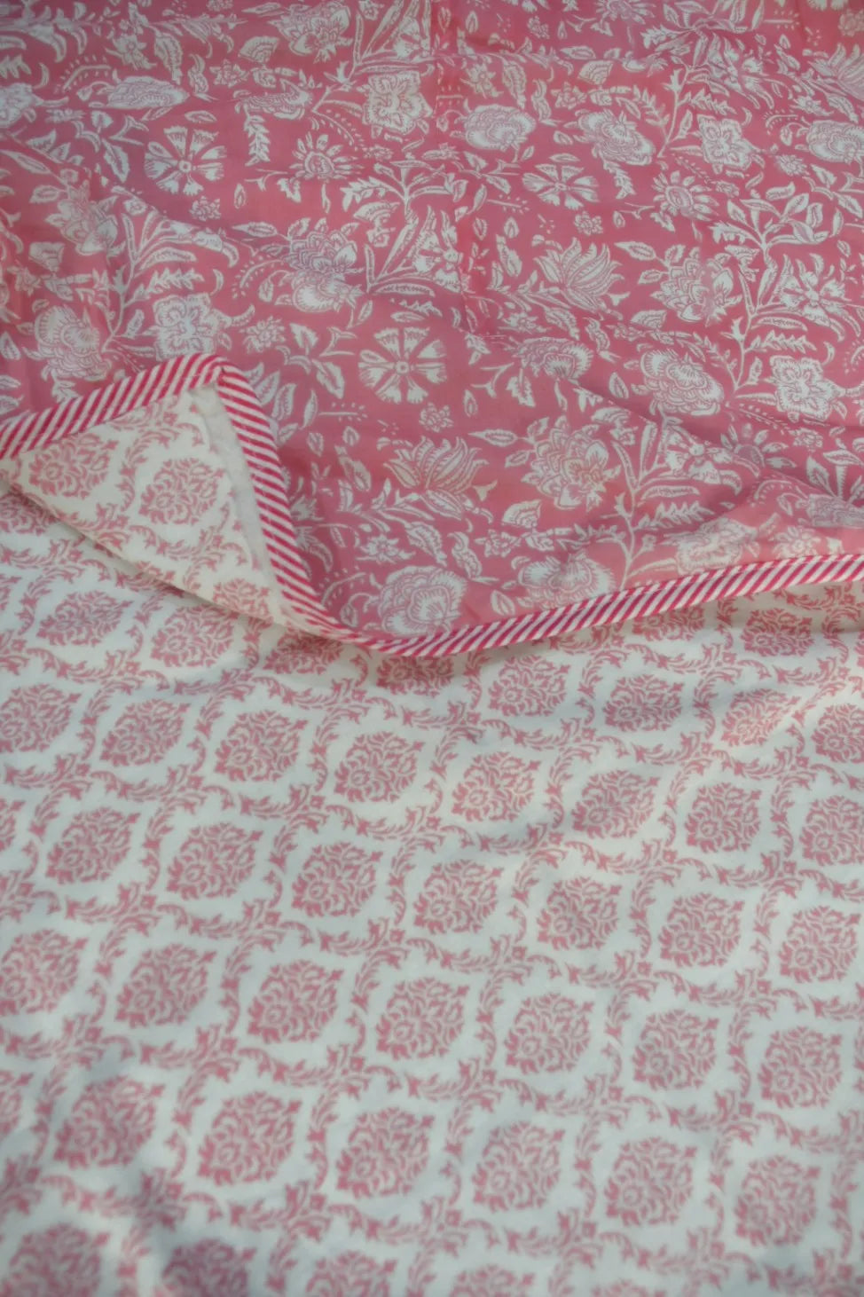 Pink and white patterned Dohar with a visible seam