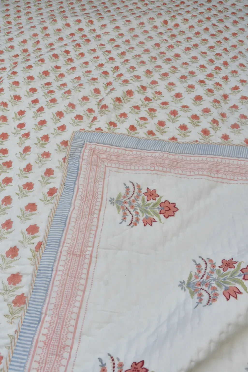Floral patterned fabric with embroidered border