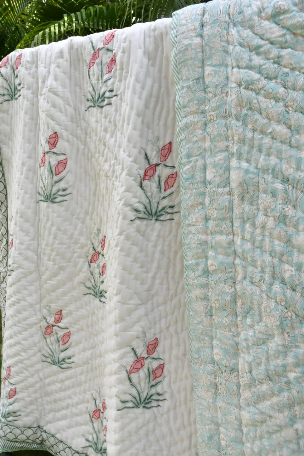 Jaipuri Quilt with floral motifs on a green background
