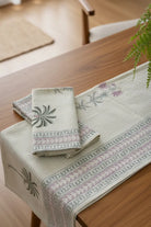 Decorative bath and hand  with floral patterns on a wooden table