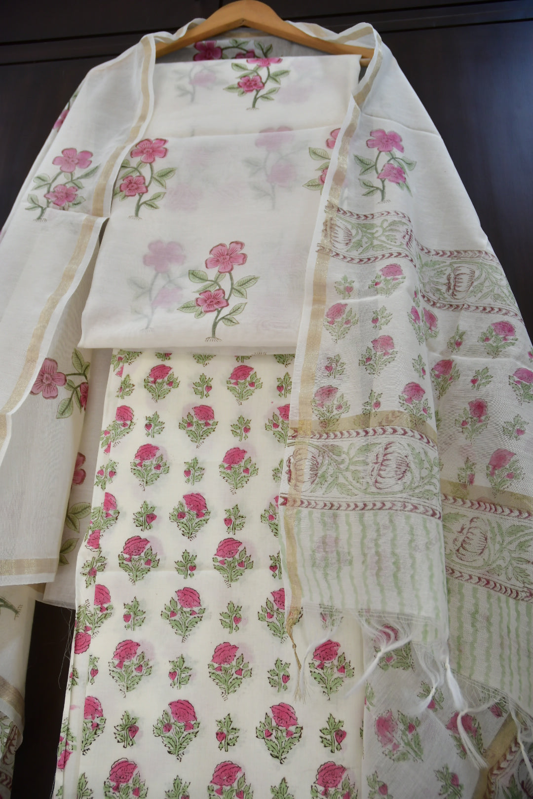 Floral patterned fabric on a wooden surface