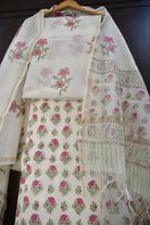 Floral patterned fabric on a wooden surface