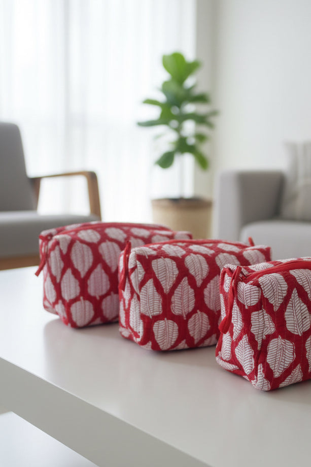 Red and white patterned fabric on a wooden surface
