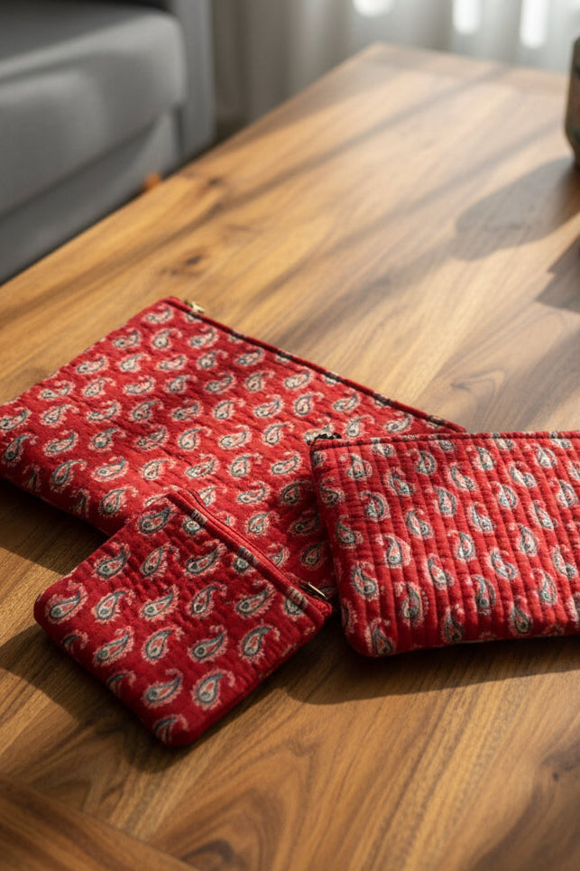 Red patterned fabric on a floral-patterned background