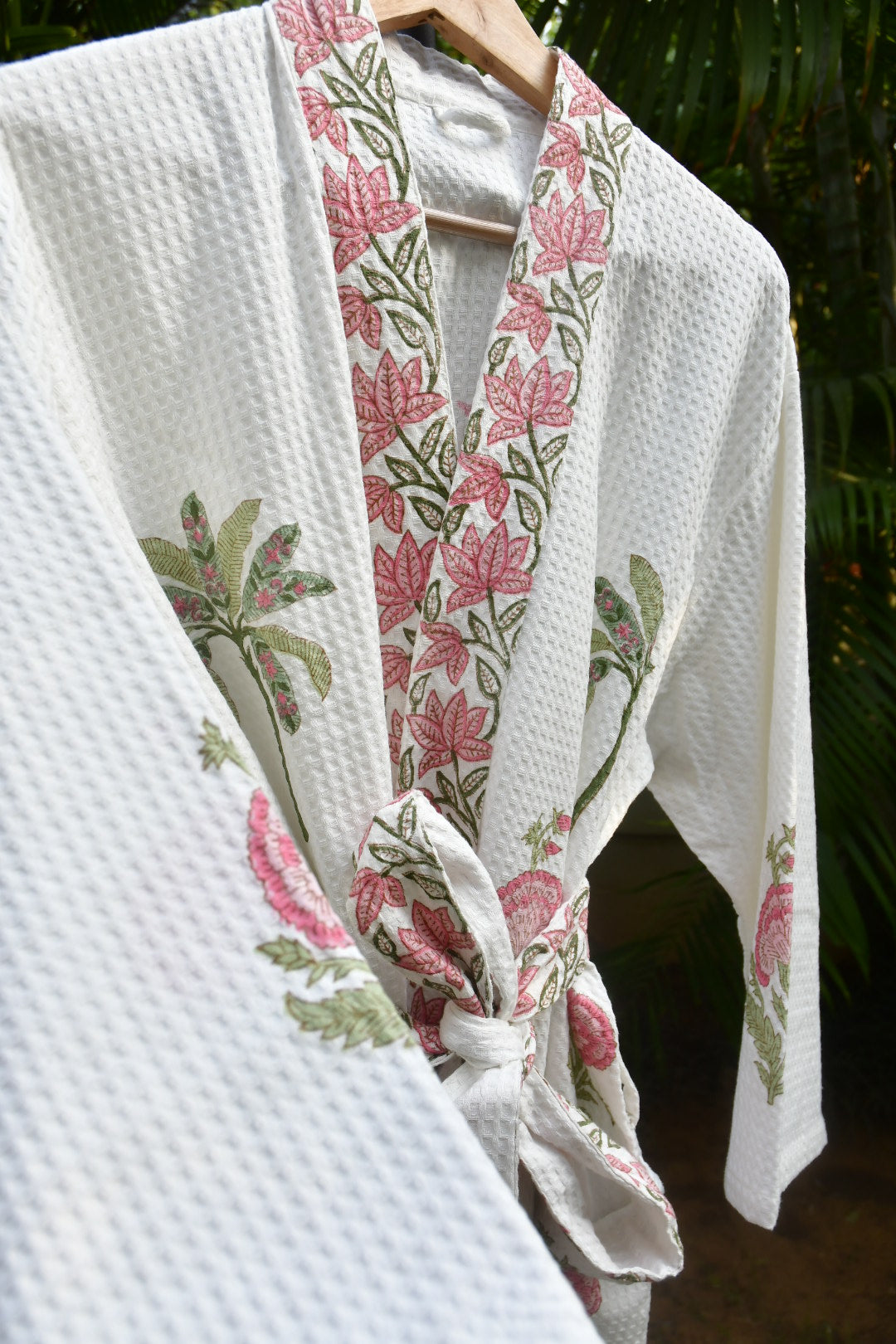Floral-patterned robe on a white background