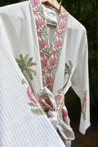 Floral-patterned robe on a white background