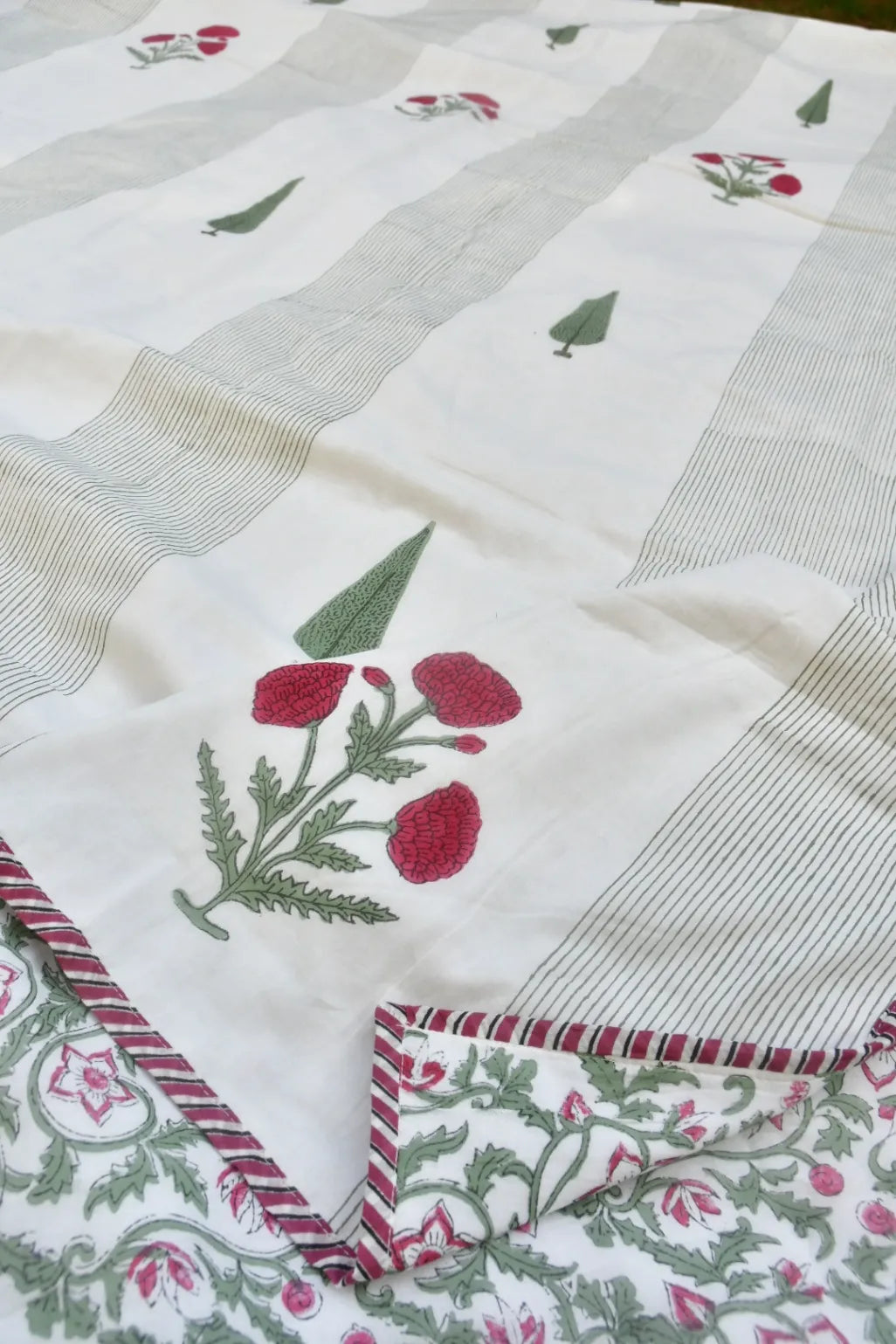 Embroidered fabric with floral patterns on a white background